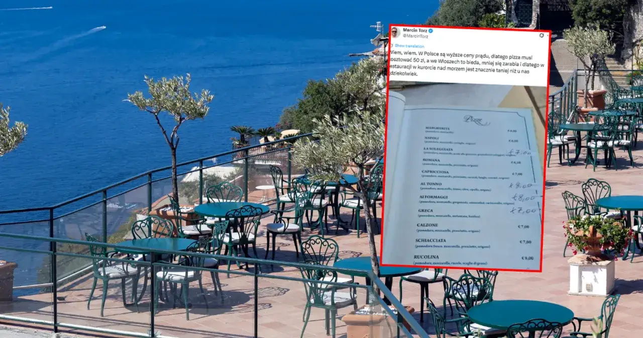 Menu z cenami pizzy w restauracji nad morzem we Włoszech, z widokiem na błękitne morze.