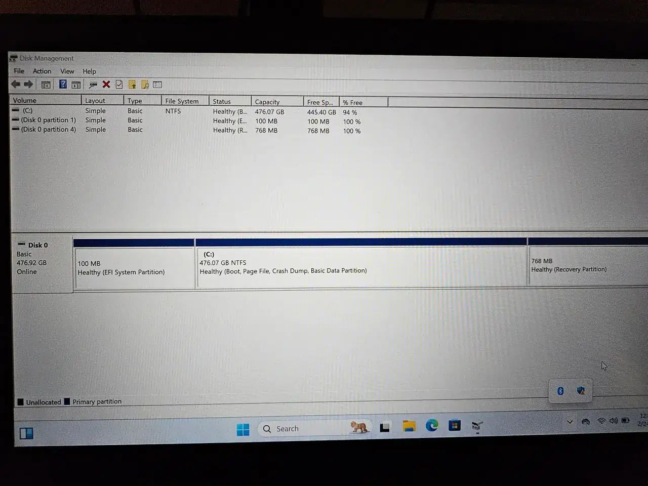 Zrzut ekranu z narzędzia Zarządzanie dyskami w systemie Windows, pokazujący partycje dysku C, EFI i odzyskiwania.