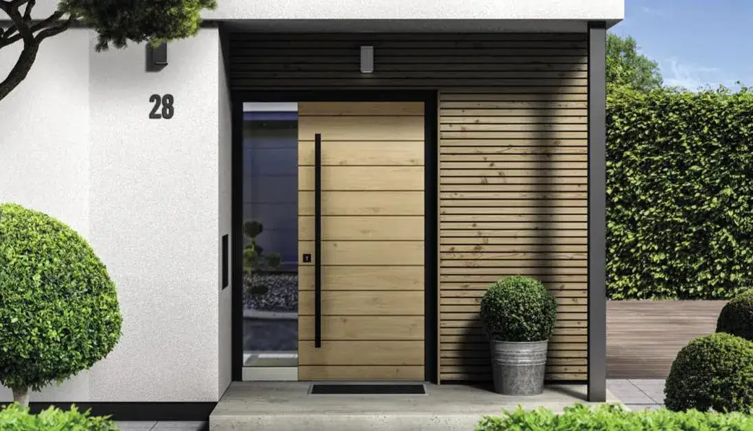 Drzwi metalowe czy drewniane do domu - co wybrać dla bezpieczeństwa?