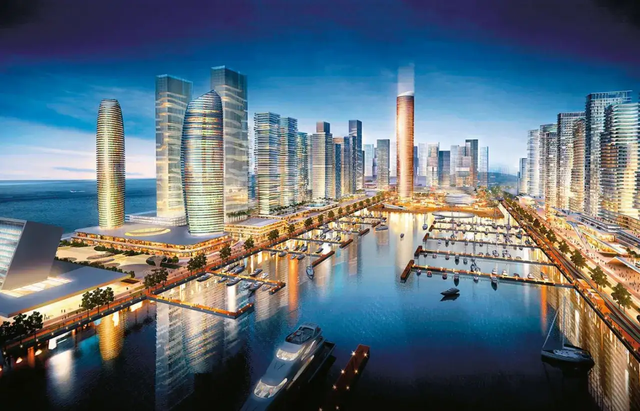 Nowoczesna afrykańska metropolia z lśniącymi wieżowcami, portem jachtowym i tętniącym życiem nabrzeżem.