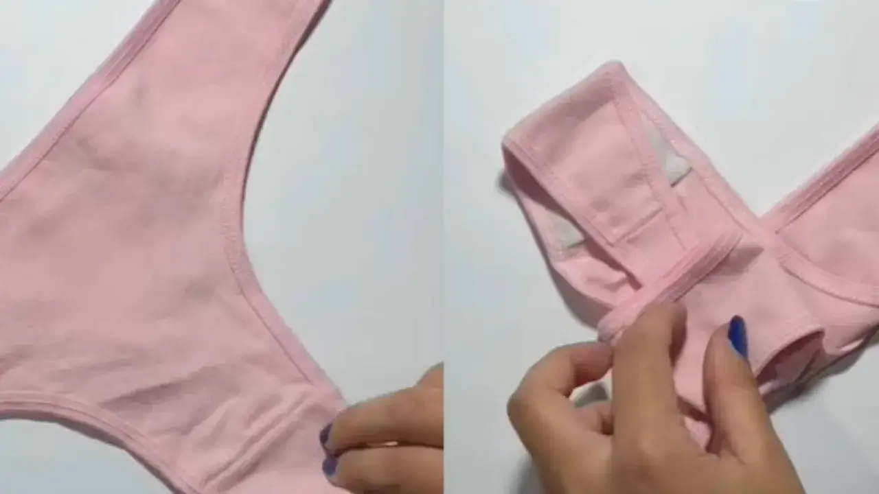 Dwie części różowych majtek, jedna rozłożona, druga składana przez dłoń.