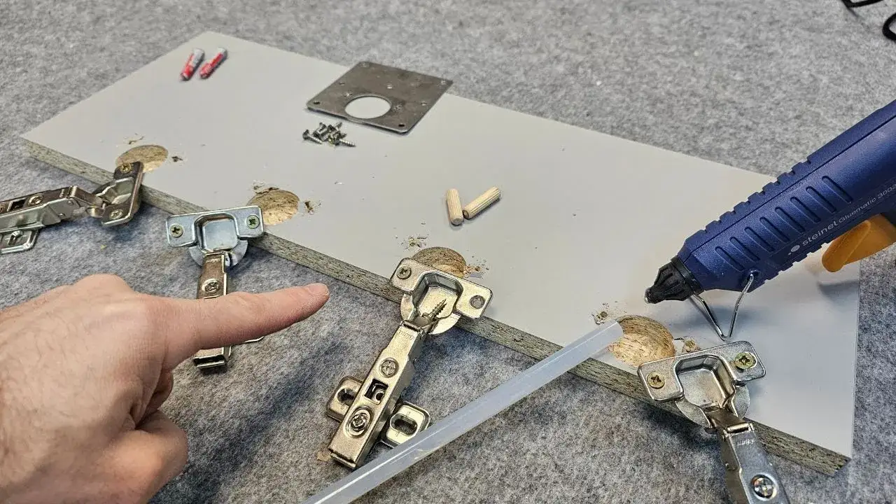 Jak naprawić wyrwany zawias w szafce i uniknąć kosztownych błędów