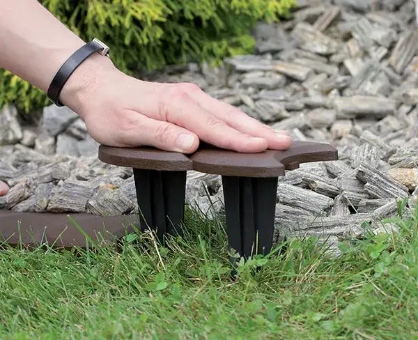 Jak układać palisady ogrodowe plastikowe - praktyczne porady i wskazówki