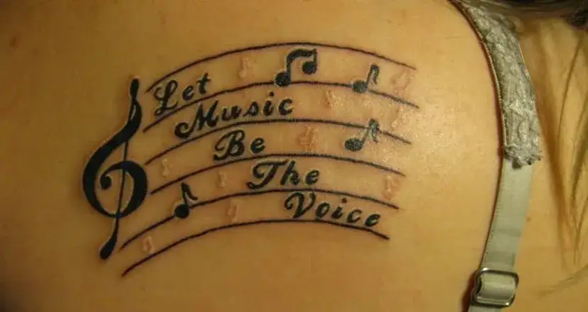 Tatuaż nuty znaczenie - odkryj głębię symboliki muzycznych tatuaży