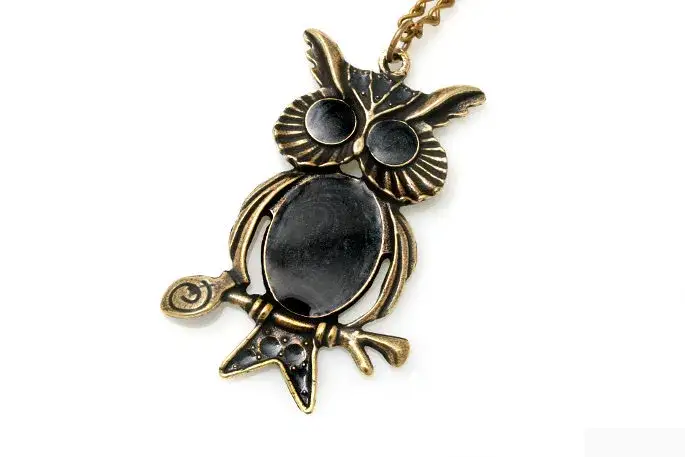 Sowa wisiorek co oznacza - odkryj tajemnice symboliki i znaczenia