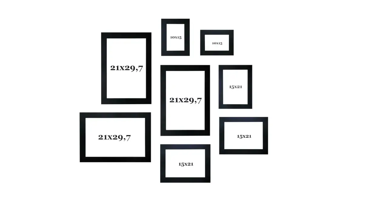 Kolekcja czarnych ram na zdjęcia: trzy 21x29,7, trzy 15x21 i dwa 10x15.