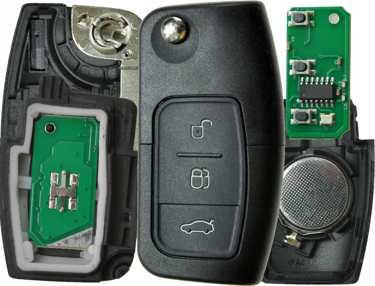 Rozłożony kluczyk Ford: widok na płytkę drukowaną, baterię i mechanizm otwierania. Dowiedz się, jak rozebrac kluczyk Ford.