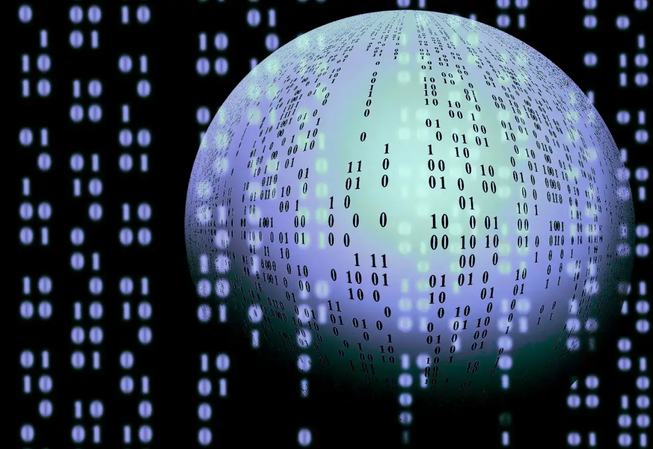 Kula z kodem binarnym na tle zer i jedynek.