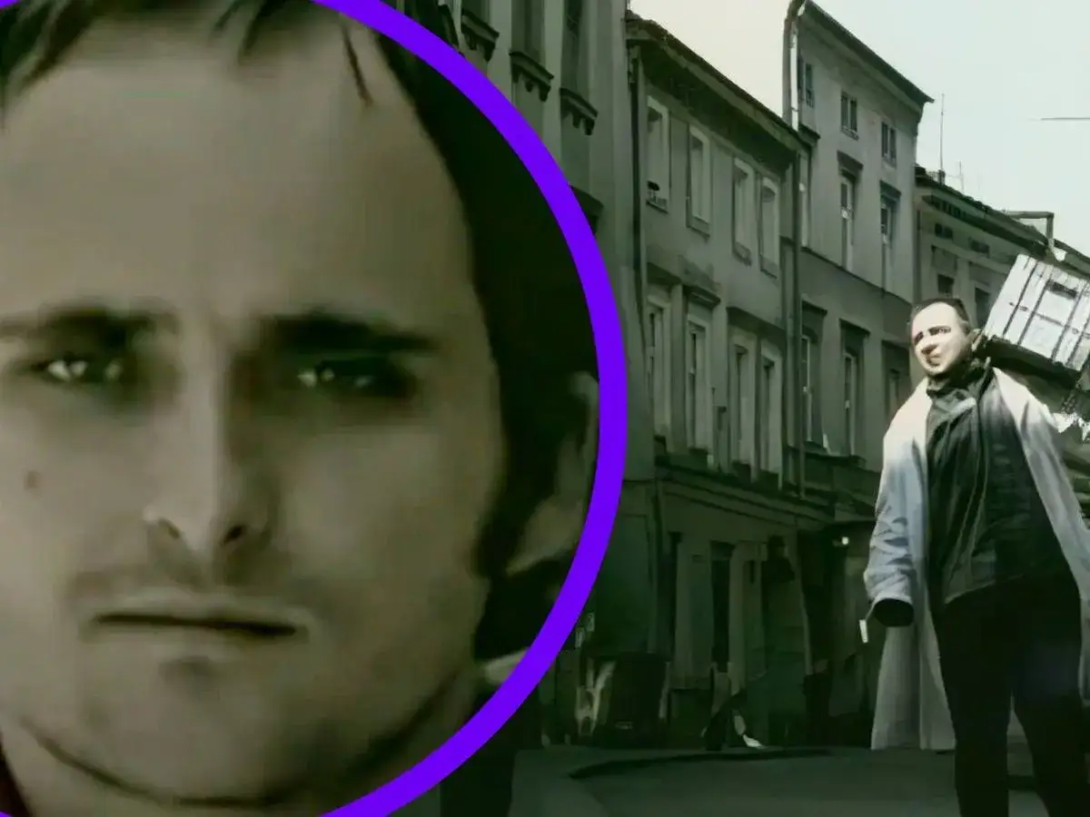 Mężczyzna z bliska, w tle uliczka z kamienicami. Kto śpiewa sprzedawcy marzeń?