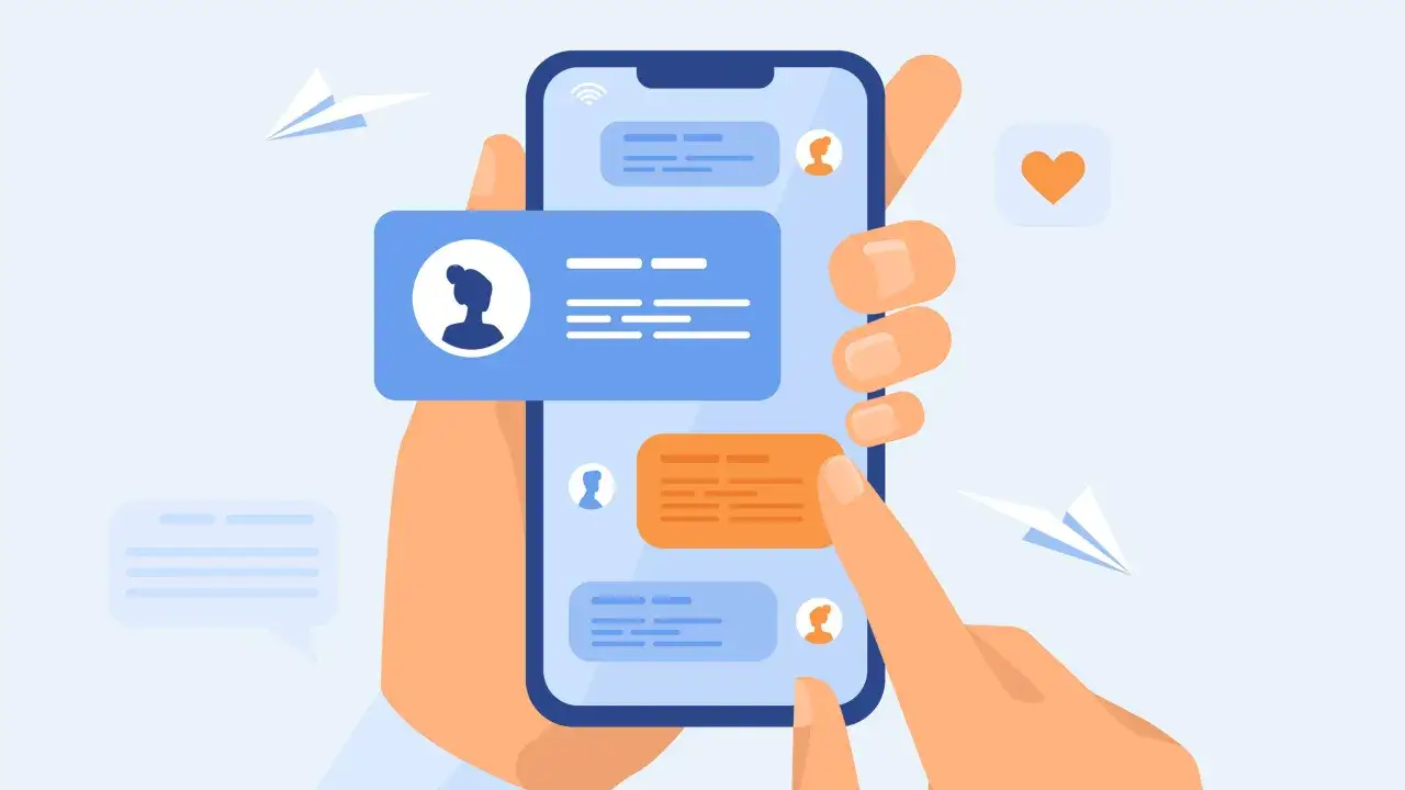 Dłonie trzymają telefon, na ekranie którego widać okna rozmów. To nowoczesne komunikatory na telefon, gdzie wiadomości lecą jak papierowe samoloty.