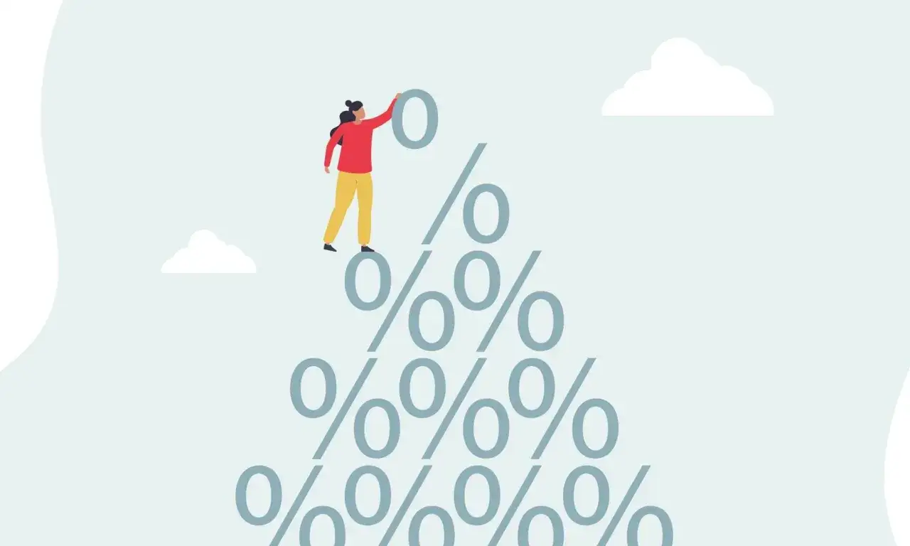 Kobieta układa procenty, zastanawiając się, czy lokaty ING się opłaca.