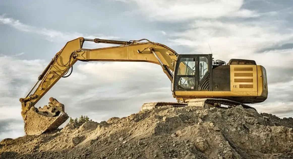 Operator koparki w Szwajcarii: zarobki, koszty, czy się opłaca?