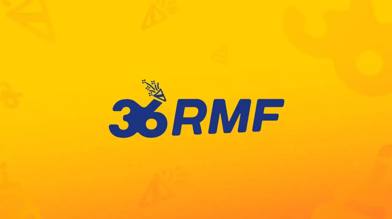 Logo RMF FM z konfetti na żółtym tle.