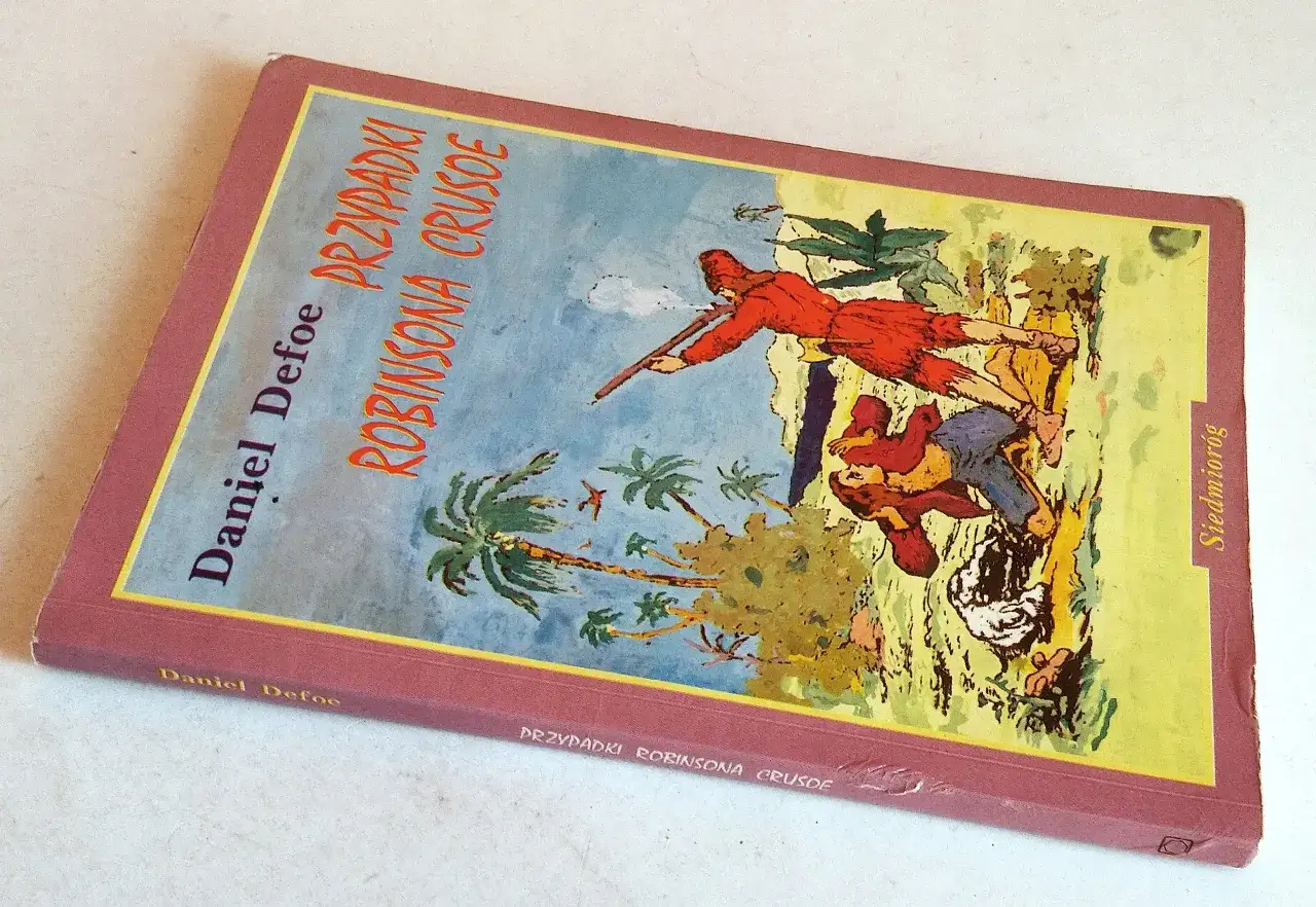 Okładka książki "Przypadki Robinsona Crusoe" Daniela Defoe. Ilustracja przedstawia dwie postacie na tle tropikalnej wyspy z palmami.