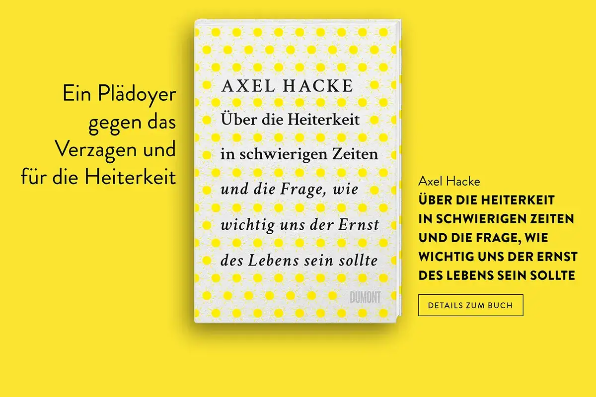 Buchcover von Axel Hacke mit Sonnensymbolen und dem Titel "Über die Heiterkeit in schwierigen Zeiten".