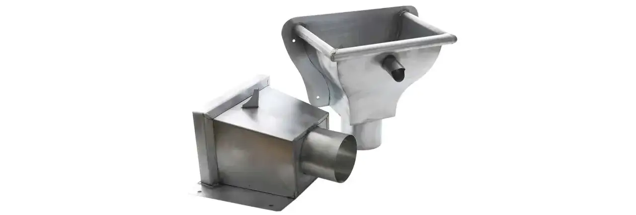 Kosze spustowe do rynien: funkcje, rodzaje i wybór idealnego