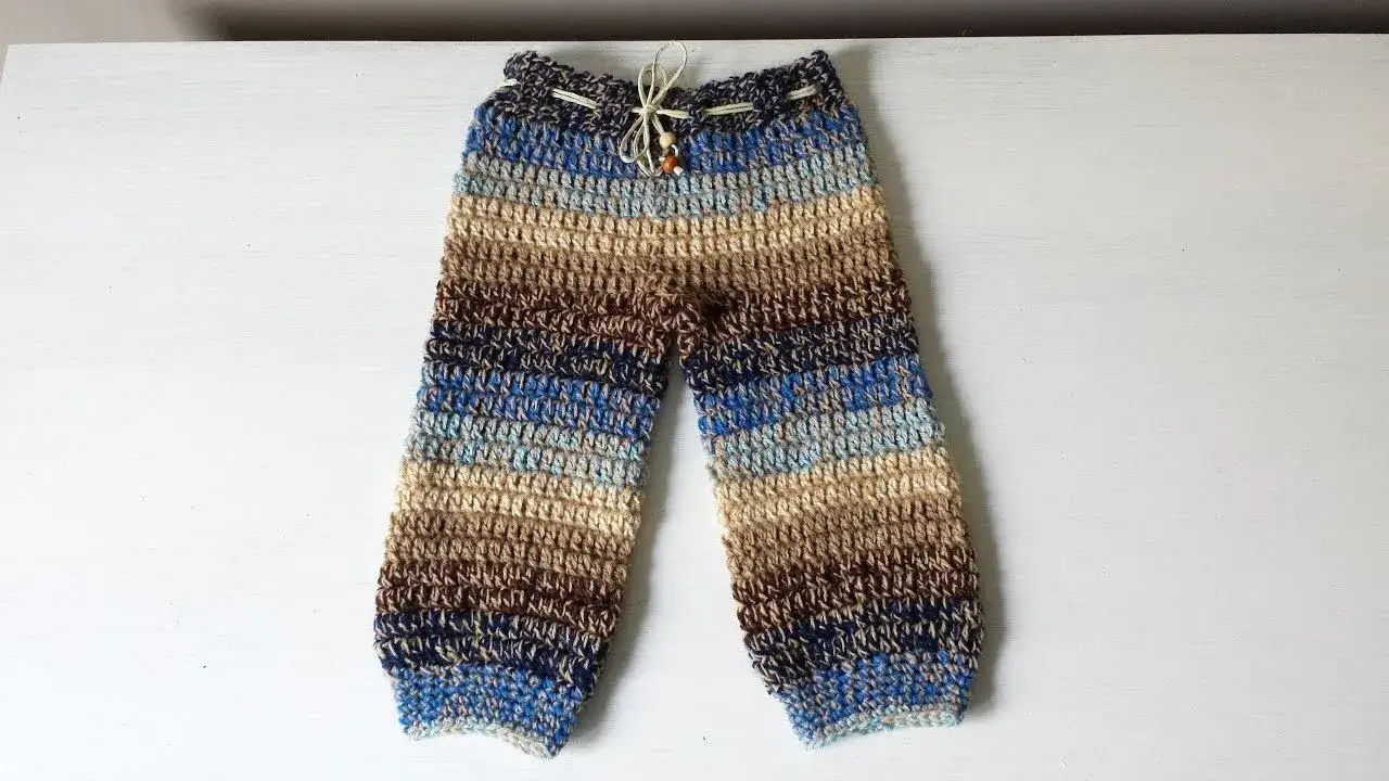 Jak zrobić spodenki na drutach dla niemowlaka: Prosty poradnik