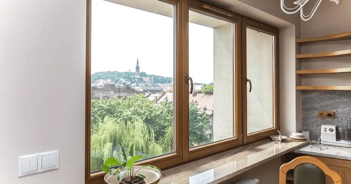 Jak dobrać parapet wewnętrzny do okna – wymiary, materiały i estetyka