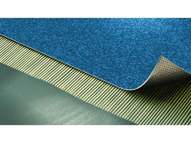 Najlepsze sposoby na przyklejenie wykładziny PCV do betonu bez błędów