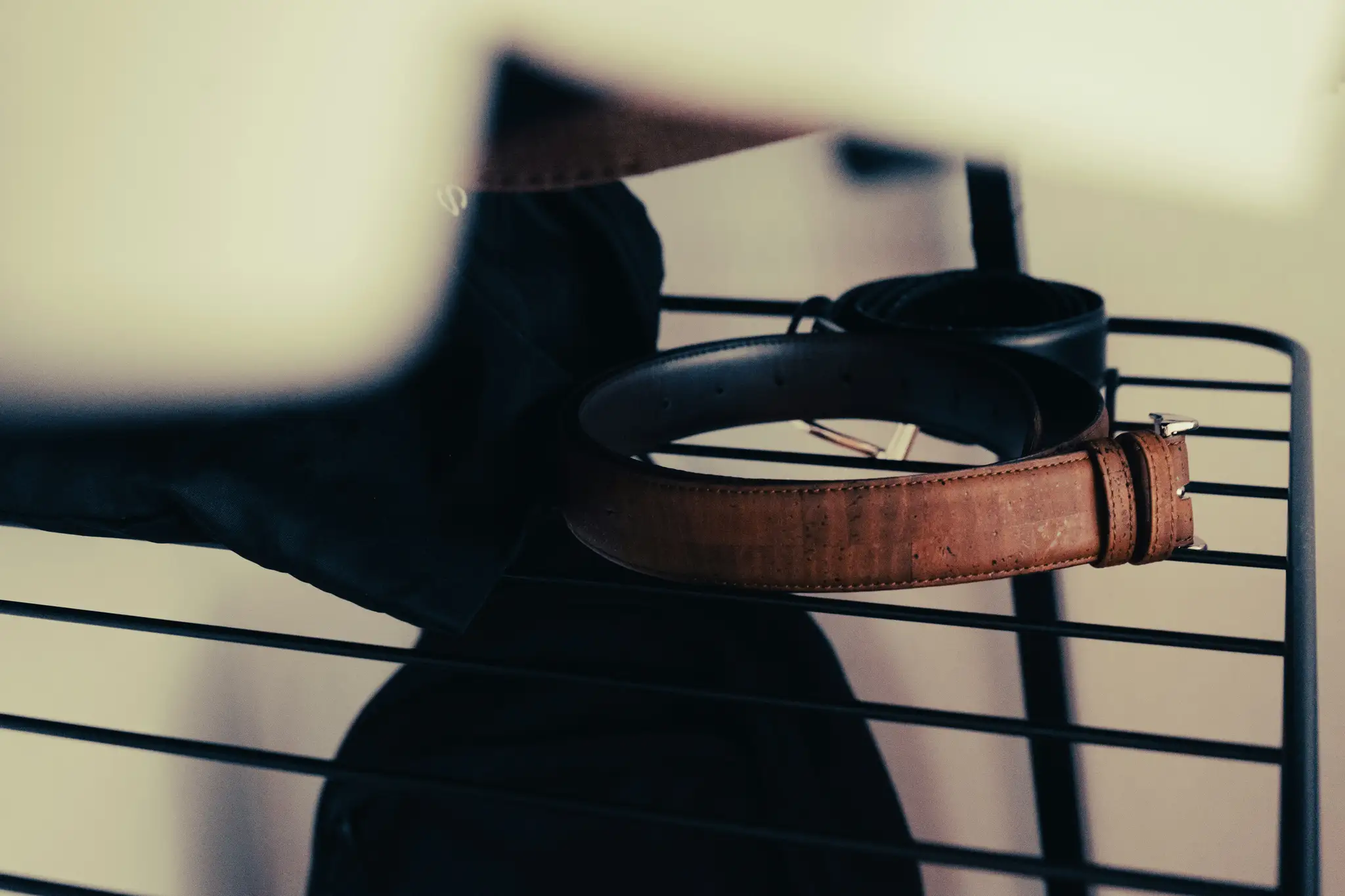 black and brown leather belt