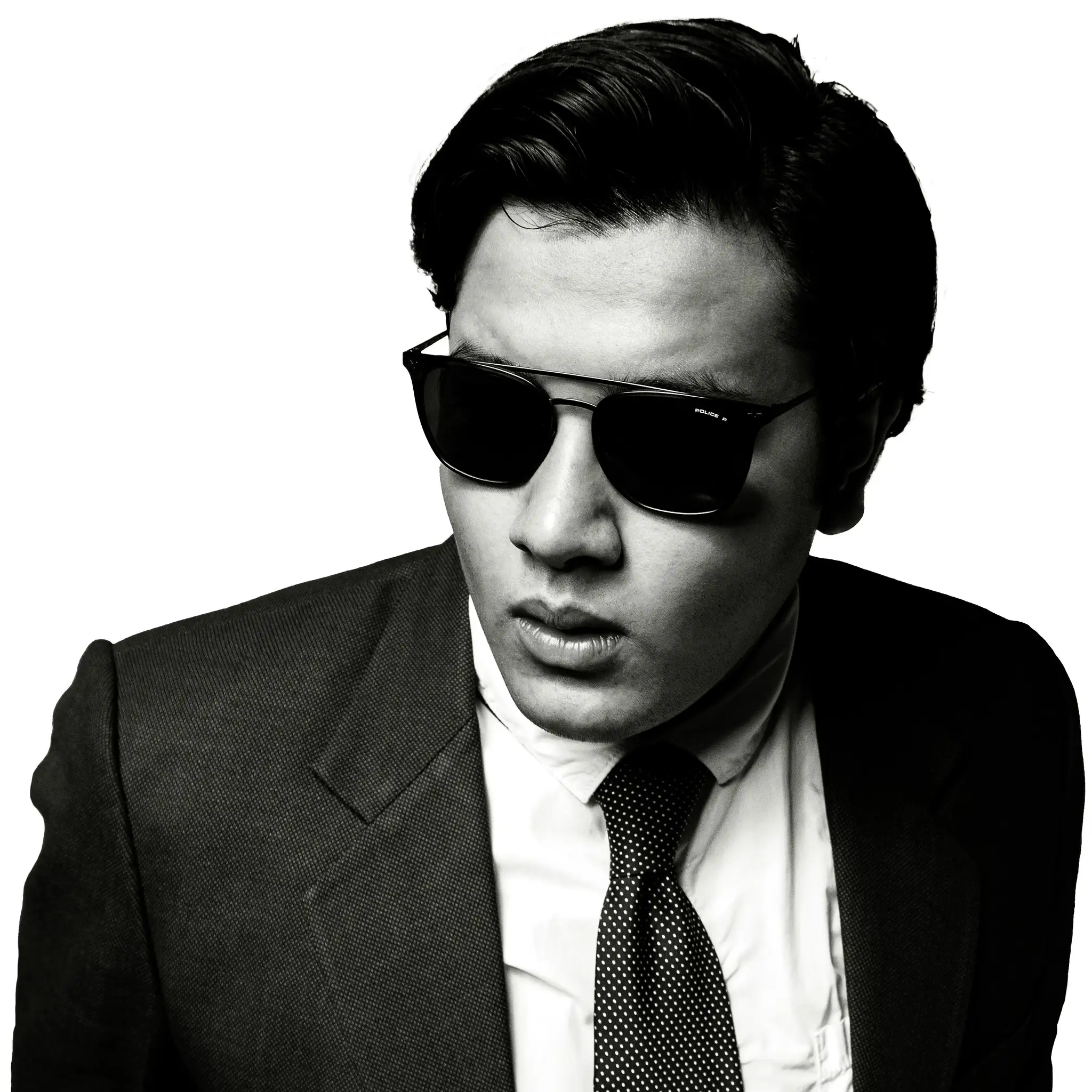 man in black suit wearing black sunglasses