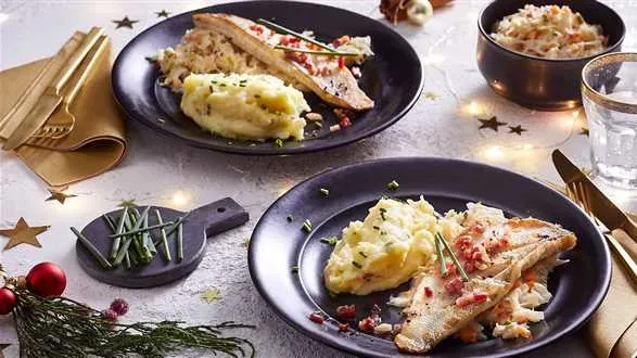 Smażony filet z sandacza z kapustą kiszoną w śmietanie