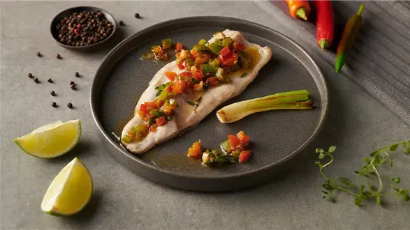 Pstrąg wędzony na sianie