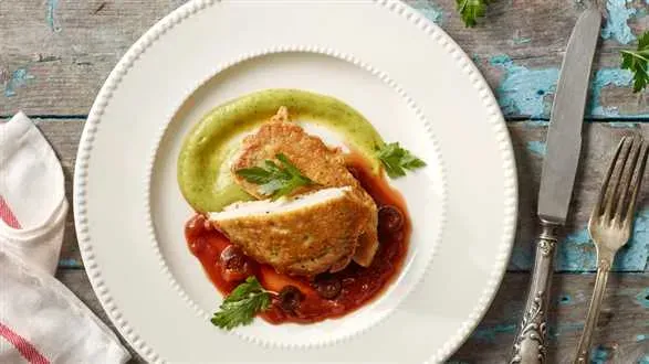 Picatta wieprzowa z sosem pomidorowym i purée z cukinii