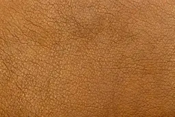 Textura de cuero marrón con finas arrugas, ideal para un grupo de trabajo de cuero.