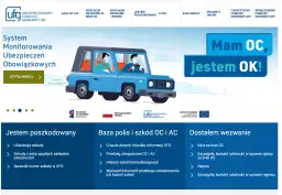 Para jadąca niebieskim samochodem, z napisem "Mam OC, jestem OK!".