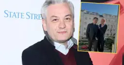 Robert Biedroń i Krzysztof Śmiszek stojący obok siebie na balkonie.