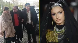 Viki Gabor z rodziną. Mężczyzna w białej koszuli i czarnej kurtce, obok niego kobieta w beżowym płaszczu.