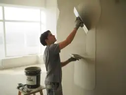 Tynkowanie krok po kroku: Poradnik DIY na gładkie ściany!