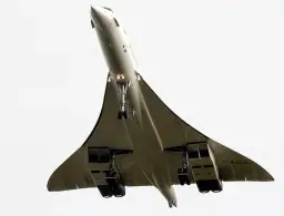 Concorde w locie, widok od dołu, z wysuniętym podwoziem.