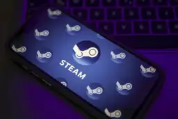 Telefon z logo Steam na ekranie, przygotowany na promocje Steam, kiedy startuje Summer i Winter Sale.