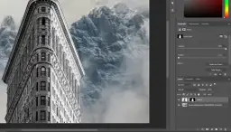 Jak połączyć kilka zdjęć w jedno Photoshop: budynek Flatiron i góry w chmurach, warstwy w programie.