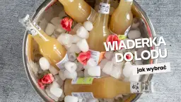Butelki z napojem w wiaderku do lodu, ozdobione różami. Idealne na upalne dni.