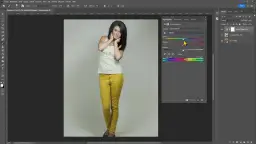 Jak zmienić kolor ubrania w Photoshopie: panel "Właściwości" z suwakami do regulacji barwy, nasycenia i jasności.