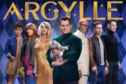 Obsada filmu "Argylle - tajny szpieg" pozuje do zdjęcia. Henry Cavill trzyma kota, a obok niego stoją m.in. Samuel L. Jackson i Dua Lipa.