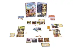 Rozłożona gra planszowa Cytadela z kartami postaci, budynków i monetami.