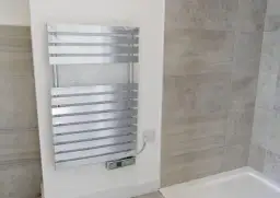 Grzejnik elektryczny do łazienki: co mówią na forum? Uniknij błędów!