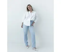 Biała koszula i spodnie: stylizacje na każdą okazję | Poradnik