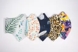 Sześć maseczek ochronnych z różnych tkanin: liście paproci, kwiaty, kosmos, panterka, kwiaty. Z czego uszyć maseczkę? Z kolorowych materiałów!