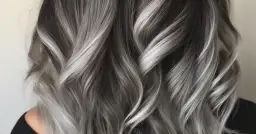 Jasne odrosty na ciemnych włosach - poradnik i sposoby na naturalne zakrycie