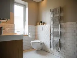 Jak dobrać moc grzejnika do łazienki? 5 kluczowych czynników