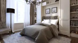 Elegancka sypialnia z wygodnym łóżkiem i stylowym żyrandolem, który idealnie pasuje do wnętrza.