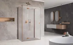 Nowoczesna łazienka z prysznicem walk-in. Zastanawiasz się, ile schnie silikon sanitarny przy montażu?