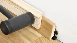 Montaż listew przypodłogowych: perfekcyjne narożniki, bez błędów