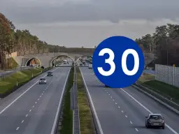 Co oznacza znak minimalnej prędkości i jakie są jego zasady?