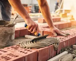 Jaka zaprawa do murowania komina? Wybierz najlepsze materiały dla trwałości